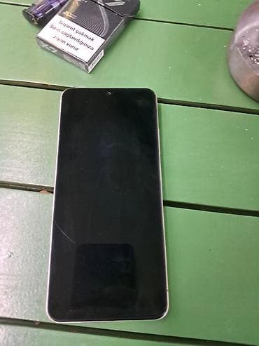 sentir: Redmi A5, 128 GB, rəng - Qızılı, Sensor, Barmaq izi, Simsiz şarj — 4