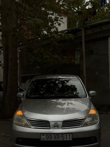 mersedes disk r15: Nissan Tiida: 1.6 l | 2006 il Sedan — 2