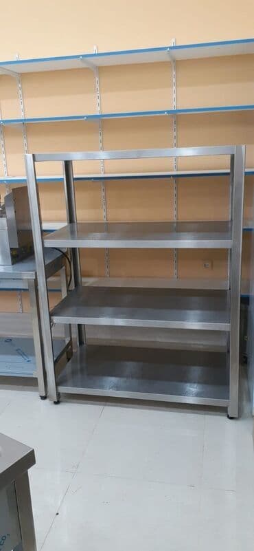 manqal doner aparati: Metal konstruksiyalı, açıq boz rəngdə çoxmərtəbəli saxlama rəfi. Bu — 2