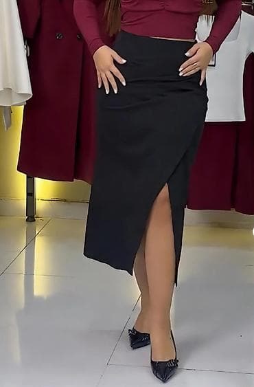 Qadın ətəyi – qara tezedi geyinilmiyib, midi uzunluq, yüksək bel. -