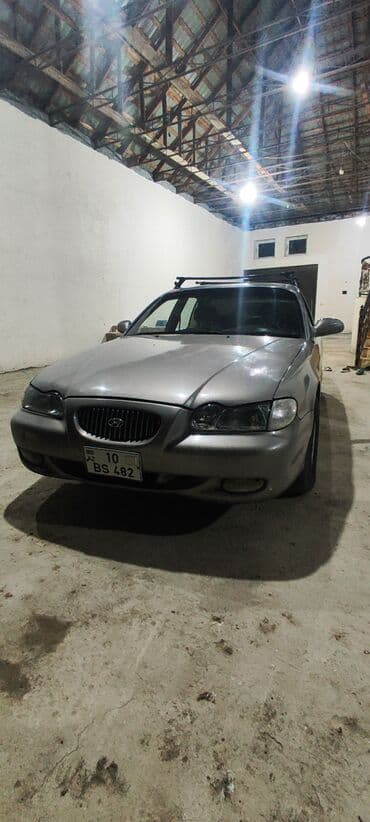 toyota corolla 2006 1.4 diesel: Hyundai Sonata sedan geniş salon. Dam üstü relslər/qalın baqaj relsi — 7