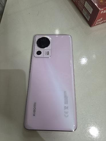 Техника и электроника: Xiaomi 13 Lite, цвет - Розовый, 
 Две SIM карты — 1
