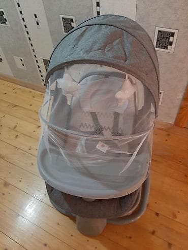 Oğlan və qız üçün, Beşik, Yellənmə mexanizm ilə