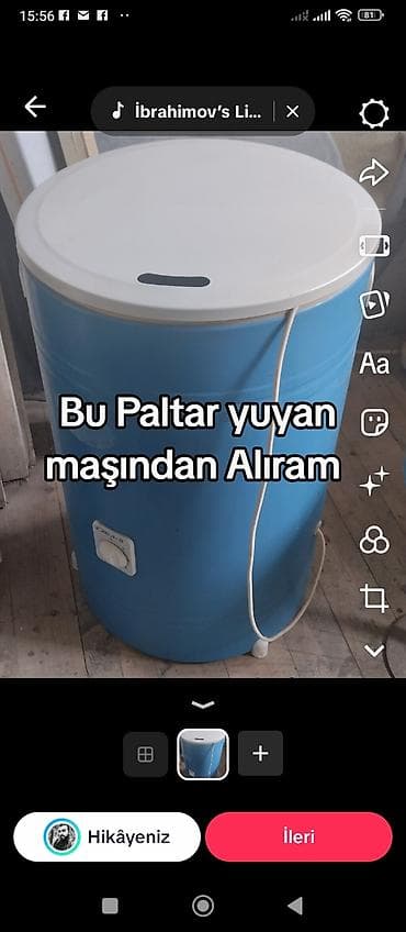 Sadə tip paltar yuyan maşın – mavi plastik gövdə, üstdən yüklənən