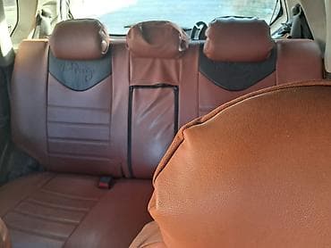 statır: Ailə üçün əlverişli 5 qapılı hetçbek. Ağ rəngli kuzov, yüngül lehimli — 4