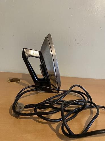 braun utu: -Sovet vaxtinin elektrik ütüsü. islek veziyyetde 
Whtsp var — 5