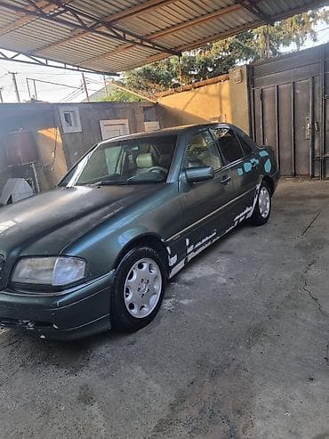 tesla disk: Mercedes-Benz 220: 2.2 l | 1994 il Sedan — 5