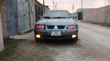 vaz 21011 ucuz qiymete: Samand sedan – benzinli, ön ötürücülü. Gümüşü rəng.nömrə nişanı — 7