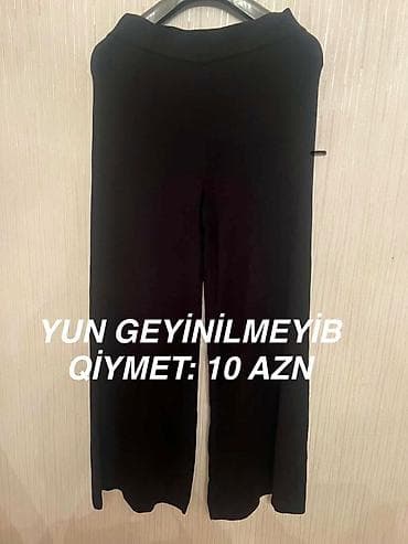 qaqa şalvarı: === PART 1: TEXTUAL DESCRIPTION === Qara rəngdə, yun materialdan — 1