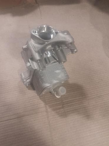 06 oturacaqlari: MAHLE/BEHR yağ-soyuducu (oil cooler) modulu - Brend: MAHLE / BEHR - — 1