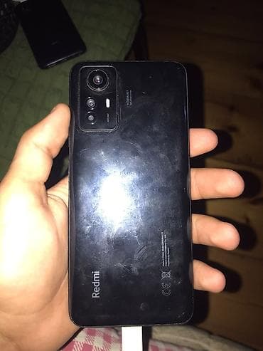 plansetler ucuz qiymete: Xiaomi Redmi smartfon - Model: Redmi (arxa qapaqda “Redmi” loqosu) — 2