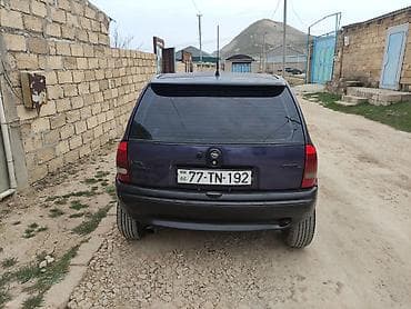 teker 14: Opel Corsa B, 5 qapı, tünd bənövşəyi rəngli hetçbek. Xüsusiyyətlər: - — 8