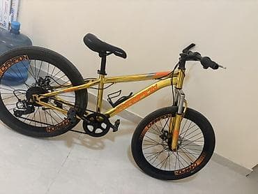 Qızılı rəngli CHAMPION velosiped - Rəng və dizayn: Parlaq