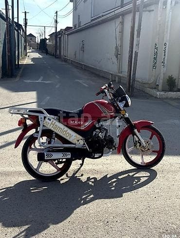 190 fara: Qırmızı rəngli MX49 motosiklet - Model: MX49 (karbon örtüklü dekor — 2