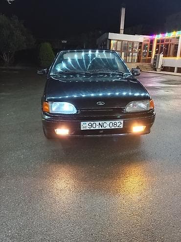 Avtomobil: Qara rəngli sedan, Lada/Samara ailəsi (21015 tipli kuzov)