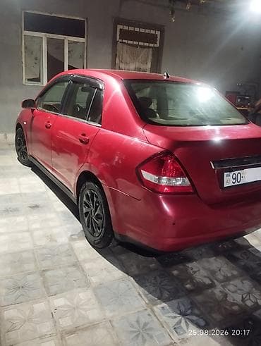 a6 audi: Nissan Tiida: 1.6 l | 2008 il Sedan — 2