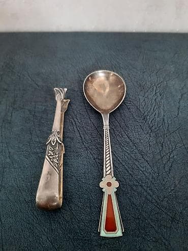 80 qramdi - Material: Metal (gümüşü tonlarda), qabıq formalı kasa