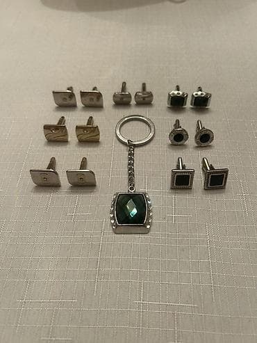 Kişi aksessuarları dəsti - 7 cüt qol düyməsi: - Gümüş tonunda