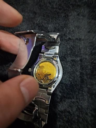 İşlənmiş, Qol saatı, rəng - Gümüşü — 10