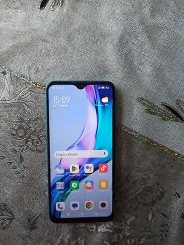 Redmi smartfon Əsas xüsusiyyətlər: - Rəng: mavi/yaşıl gradient arxa