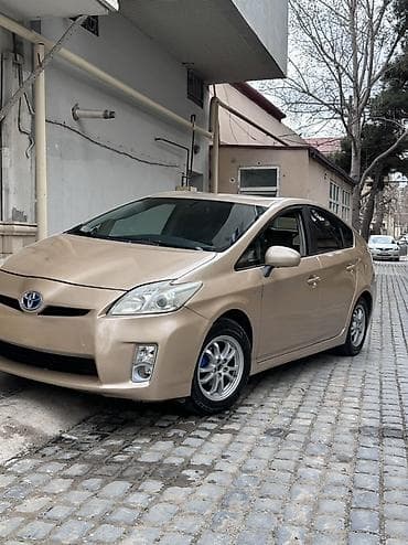 tap az prius: Toyota Prius (III nəsil) hibrid liftbek - Rəng: açıq qızılı/bej, qara — 5