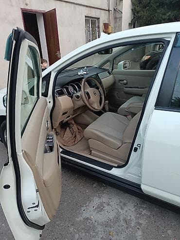 audi 6: Nissan Tiida: 1.6 l | 2011 il Hetçbek — 9