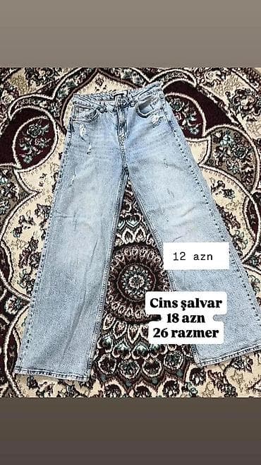 Cins şalvar – açıq mavi rəngdə, düz kəsim. Yüksək bel, beş ciblə