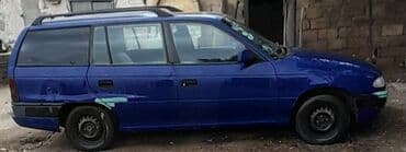 daewoo nexia satilir: Mavi rəngli universal (station wagon) kuzovlu minik avtomobili — 7