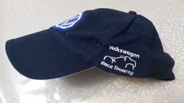 kişilər ucun dəri papaqlar və kepkalar: Volkswagen emblemli beysbolka. Materialı: pambıq. Rəngi: tünd göy. Əla — 2