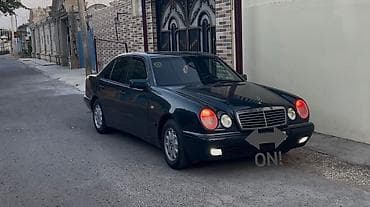 mercedes panel: Mercedes-Benz E-Class: 2 l | 1996 il Sedan — 1