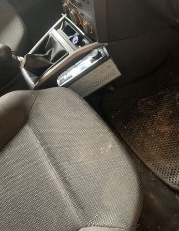 Магнитолы: Avtomobil üçün tam audio sistemi Tərkib: - Ön panel üçün 1DIN — 1