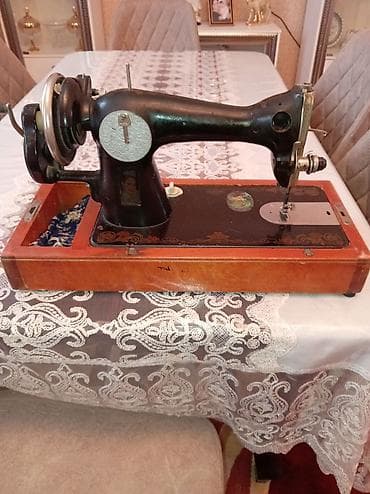 Mekaniki tikiş maşını – klassik, ağır metal korpuslu model — 1