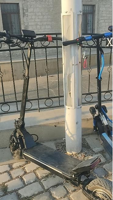 Elektrikli samokatlar: (TEZEDİR 4 AYDIRKİ ALINB) Rvokda maşını bele aparır 2mator işdiyir — 4