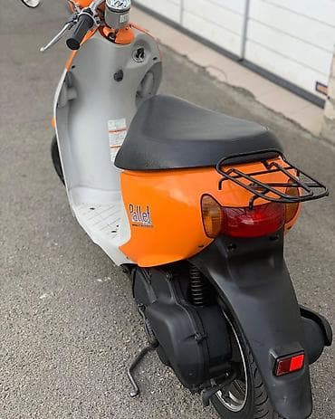 elektrikli cross motor: Suzuki skuter – parlaq narıncı/ağ rəng kombinasiya, şəhər içi rahat — 6