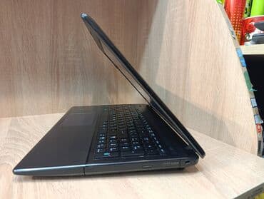 Apple MacBook: Asus X55VD — 7