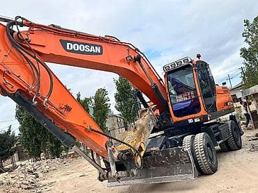 avtomobil icarəyə: Salam Tekerli ekskavator icaresi Ayliq ve günlük — 1