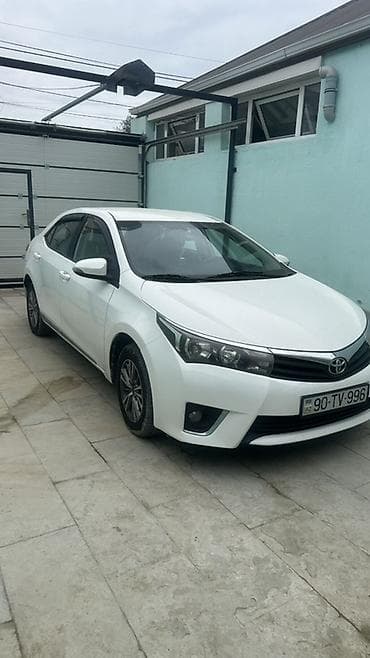 e class: Toyota Corolla: 1.6 l | 2015 il Sedan — 4