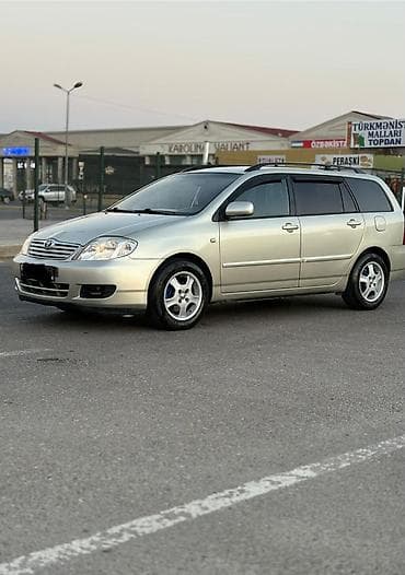 volkswagen polo 1: Toyota Corolla: 1.4 л | 2006 г. Универсал — 5