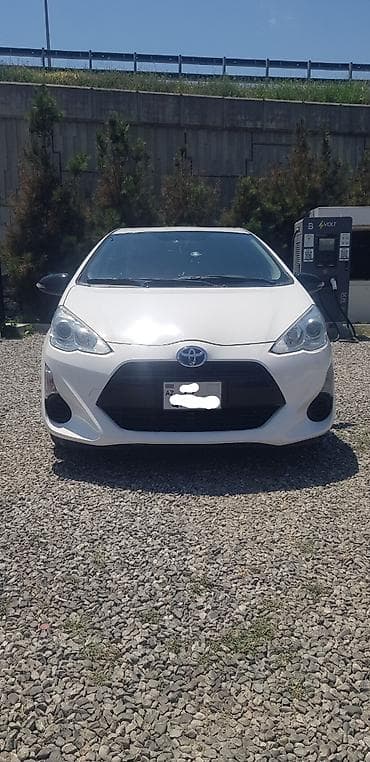 Toyota Aqua: 1.5 l | 2018 il Hetçbek