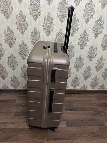 Книги и журналы: Gino Rossi sərt korpuslu çamadan - Rəng: qəhvəyi/bronza - Material — 4