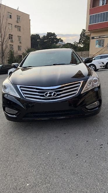 mercedes e class: Hyundai Grandeur (Azera) – qara rəngli biznes-sedan 🤝 Real alıcı ilə — 1