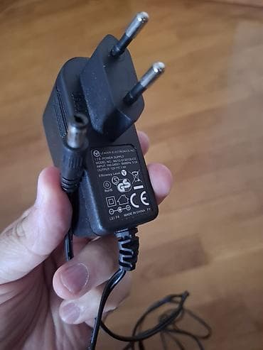 nikai tv: TV və elektronika aksesuarları dəsti Tərkib: - 12V 1.0A adapter — 2