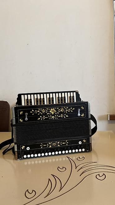 klavitura: Akustik Akkordeon, İşlənmiş, Ünvandan götürmə — 1