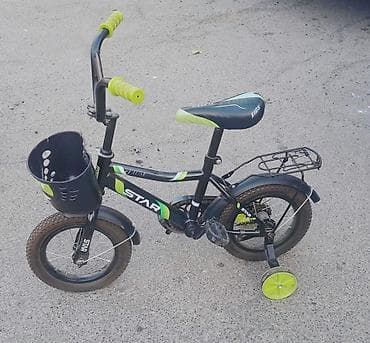 zigzag velosiped: Uşaq velosipedi satılır. Model qara rəngdədir və yaşıl aksentlərlə — 2