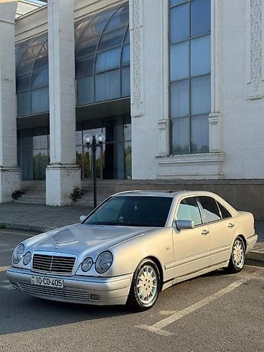 lada vaz 2107: Mercedes-Benz E 230: 2.8 l | 1997 il Sedan — 3