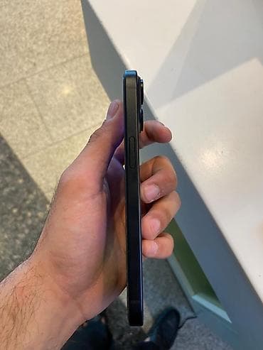 philips xenium 9@9h: IPhone 15, 128 GB, Qara, Face ID — 7