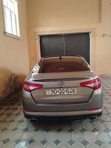 opdima: Kia Optima: 2 l | 2011 il Sedan — 2