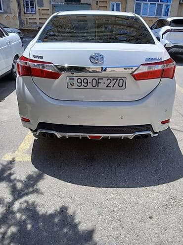 Toyota Corolla: 1.6 l | 2014 il Sedan — 5