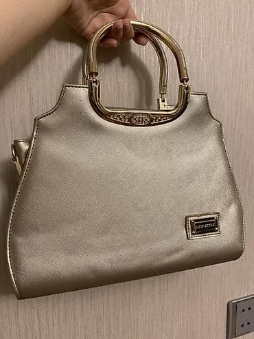 Əl çantası, İşlənmiş