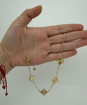 buji: Zərif boyunbağı kolleksiyası - Qızılı dörd yarpaq formalı asmalarla — 1